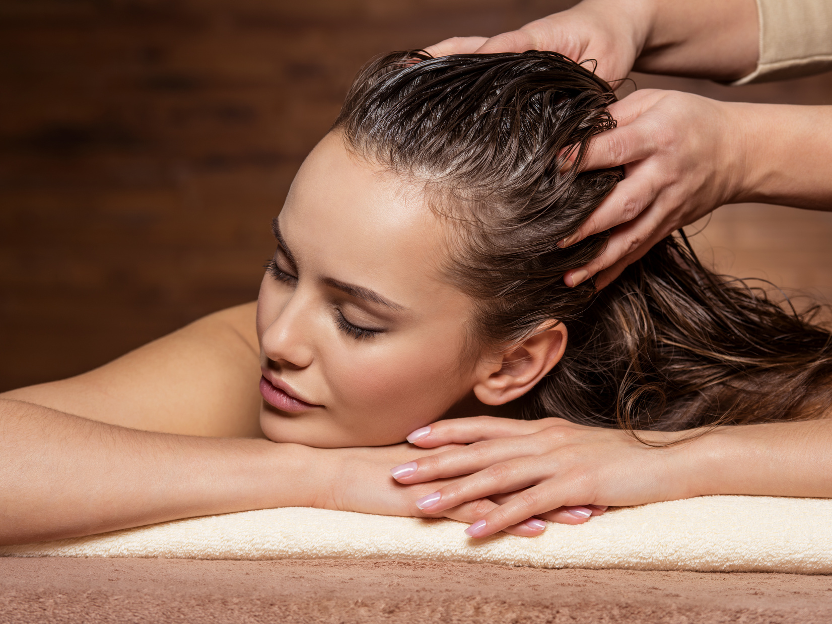A Young Woman Having a Scalp Massage